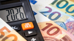 Eurozone 2026 year. Financial business concept. Money and calculator with date 2026. Market analysis. Euro currency.  exchange rate. Economic background. closeup